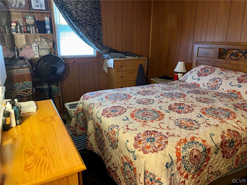 124 Haney Road Kunkletown, PA 18058 - Photo 11 of 24 a bedroom with a bed and wooden floor