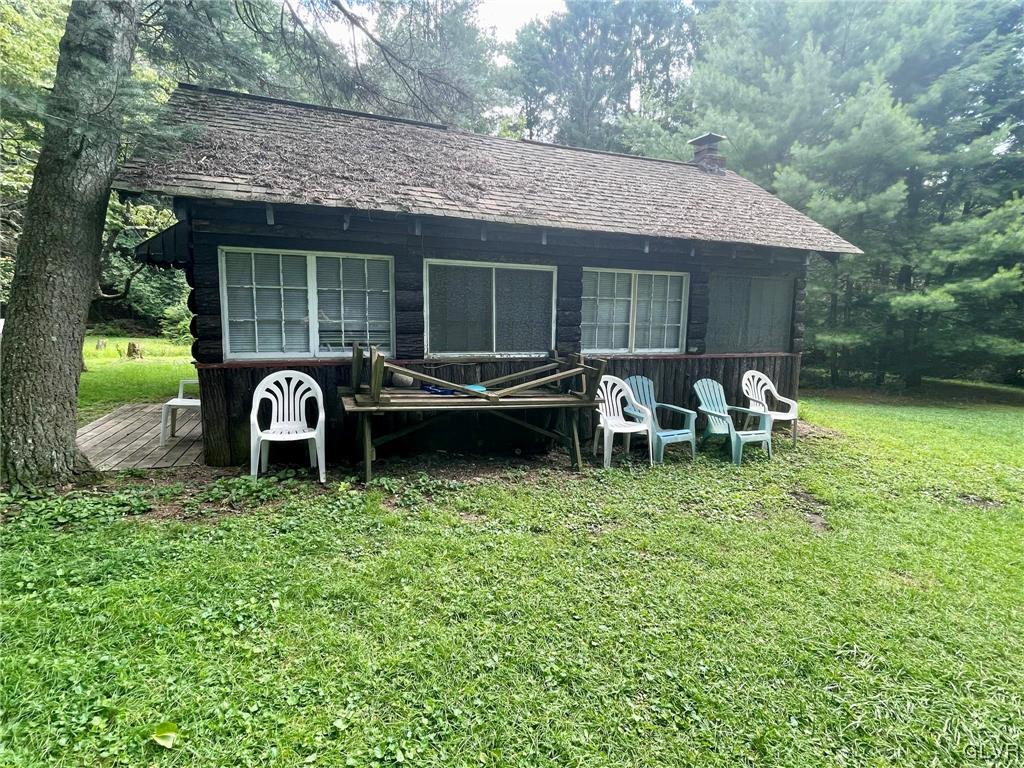 124 Haney Road Kunkletown, PA 18058 - Photo 21 of 24 a backyard of a house with table and chairs
