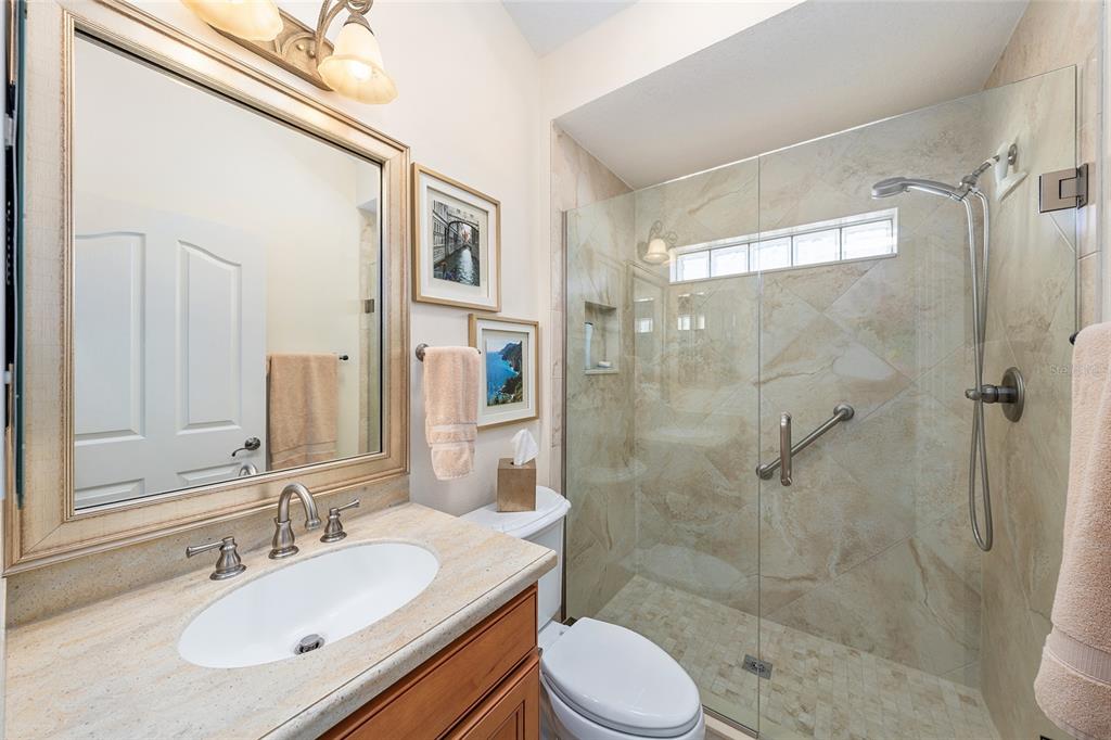 2416 Boiling Springs Court The Villages, FL 32162 - Photo 16 of 41 a bathroom with a sink a toilet and shower