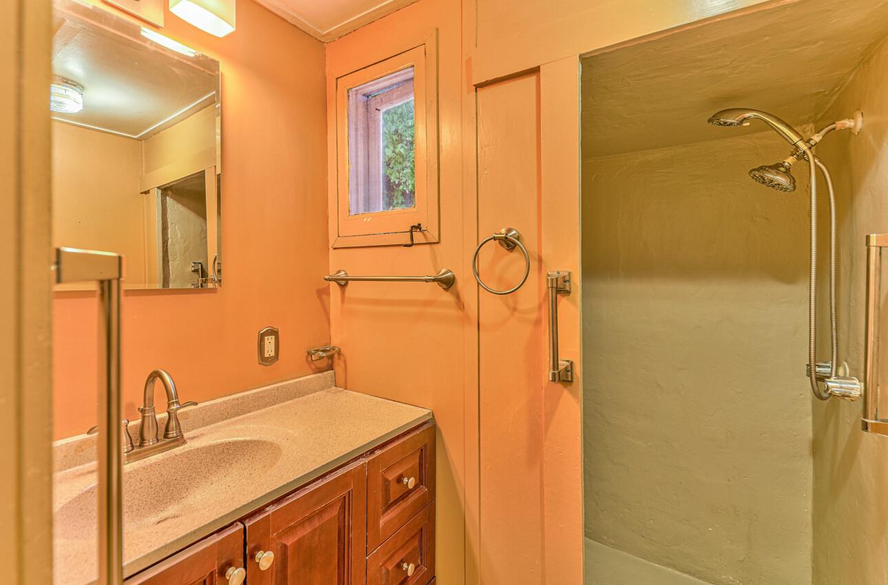 28120 Schulte Road Carmel, CA 93923 - Photo 26 of 42 a bathroom with a sink and a mirror