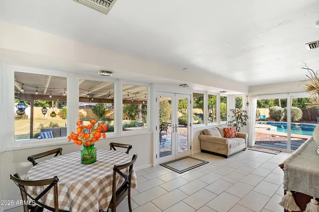 a dining room with furniture a livingroom and outdoor space