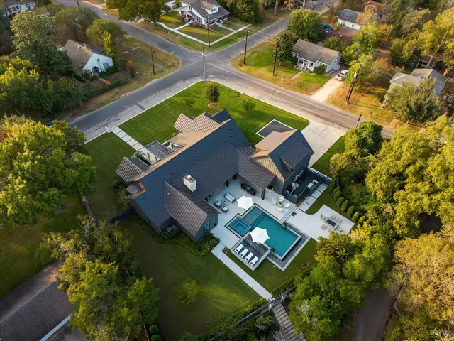 an aerial view of a house with a garden
