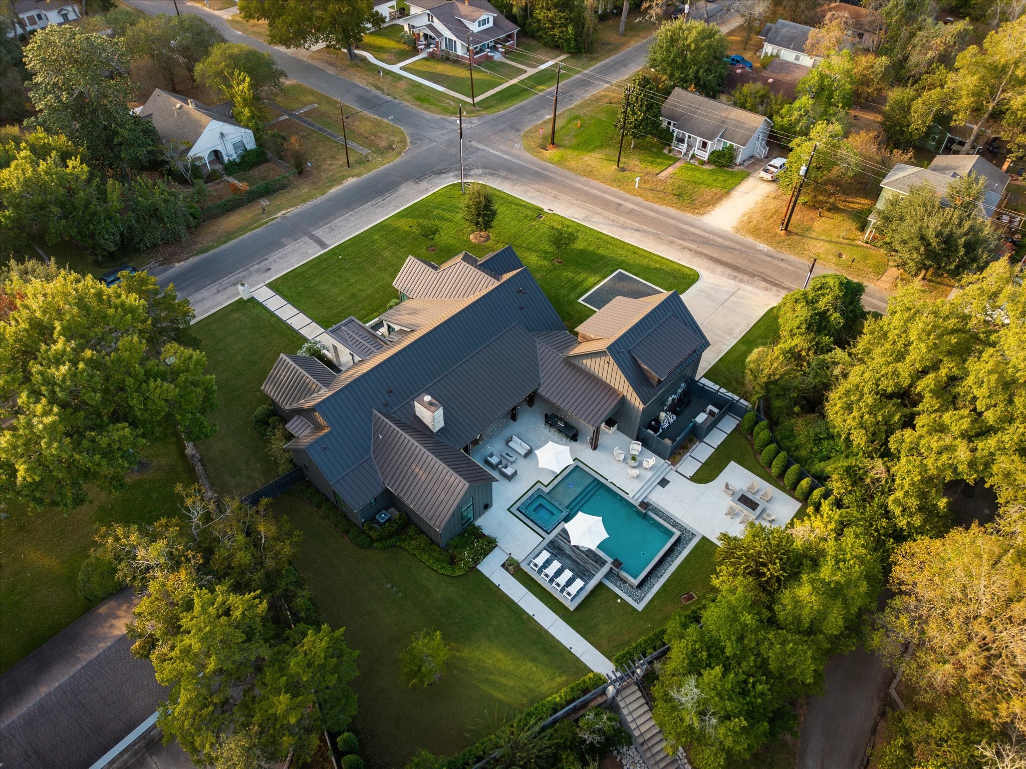 1525 Travis Street Columbus, TX 78934 - Photo 42 of 43 an aerial view of a house with a garden