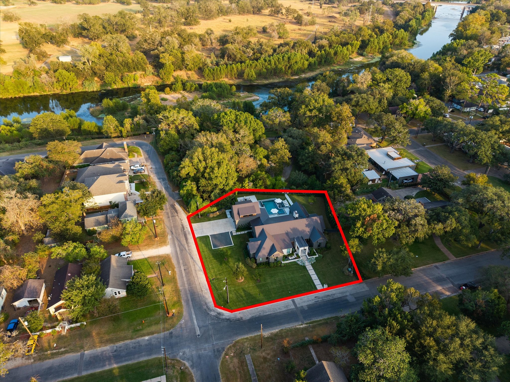 1525 Travis Street Columbus, TX 78934 - Photo 43 of 43 an aerial view of a yard