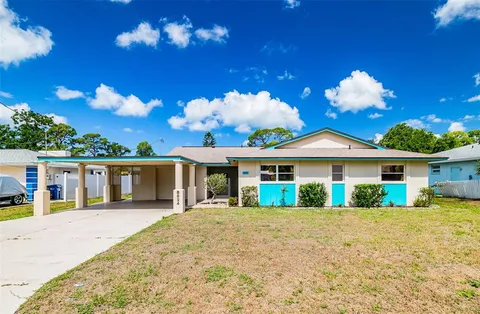 a view of house with yard and entertaining space