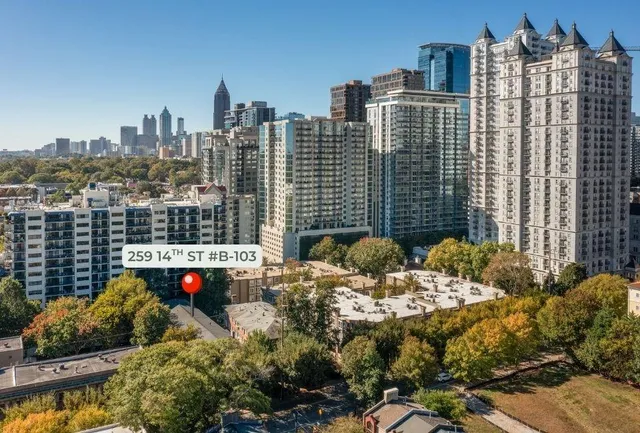 a view of city with tall buildings