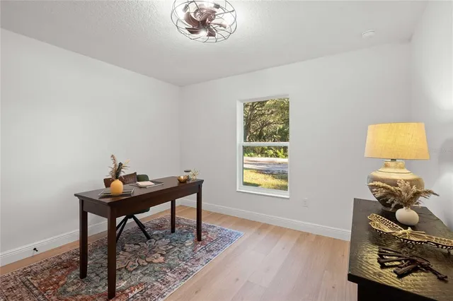 a room with a table and a window