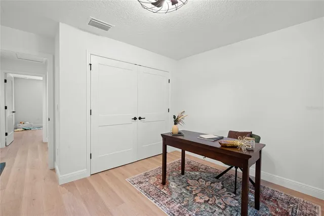 a view of a workspace with furniture