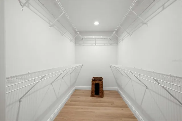 a view of a hallway with stairs