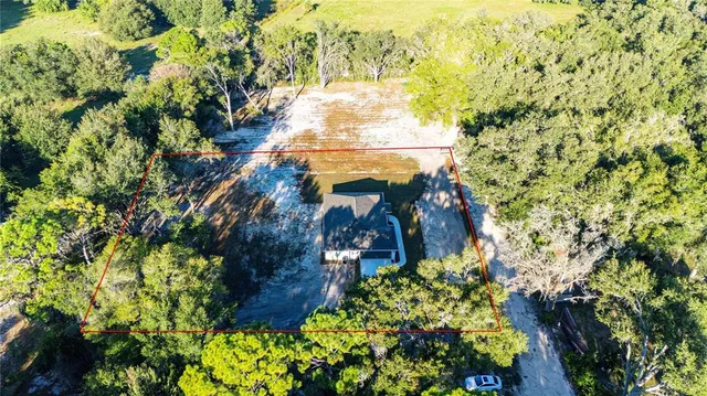 a view of swimming pool with a yard
