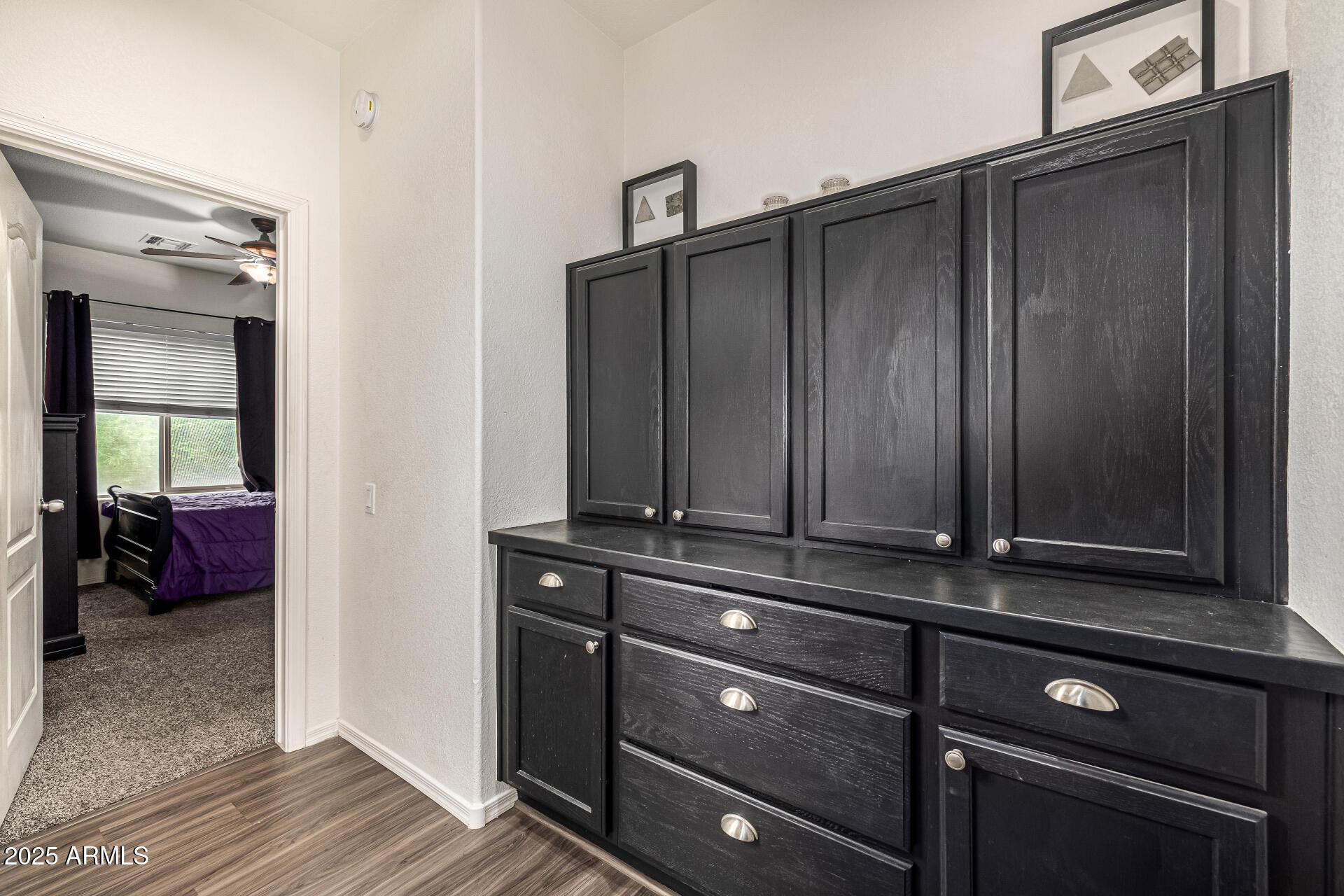 2026 North Rascon Loop Phoenix, AZ 85037 - Photo 20 of 38 a view of a closet area