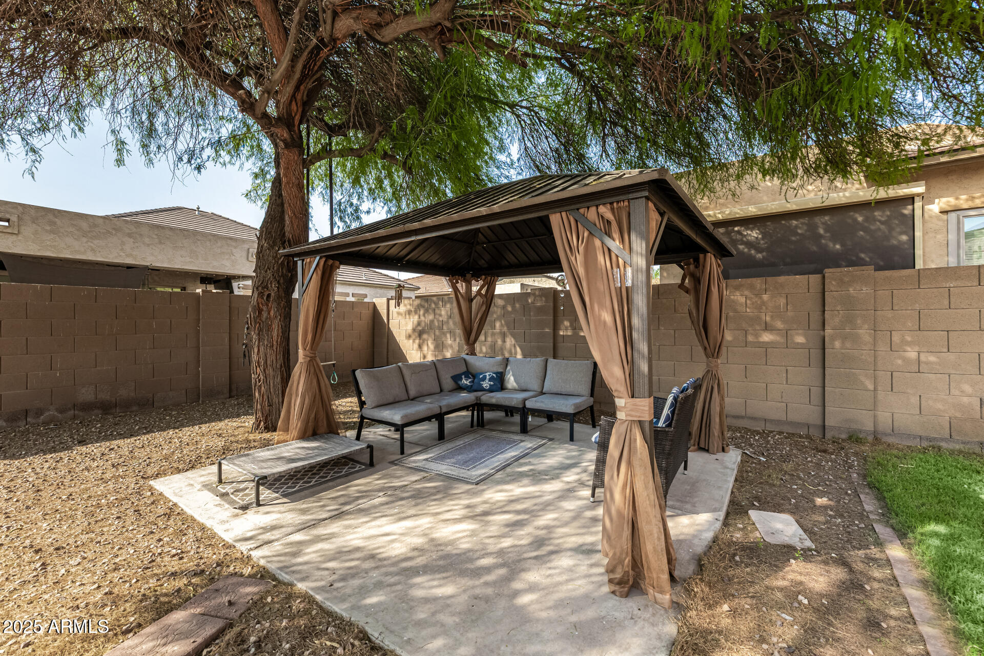 2026 North Rascon Loop Phoenix, AZ 85037 - Photo 25 of 38 a view of outdoor space and entertaining space