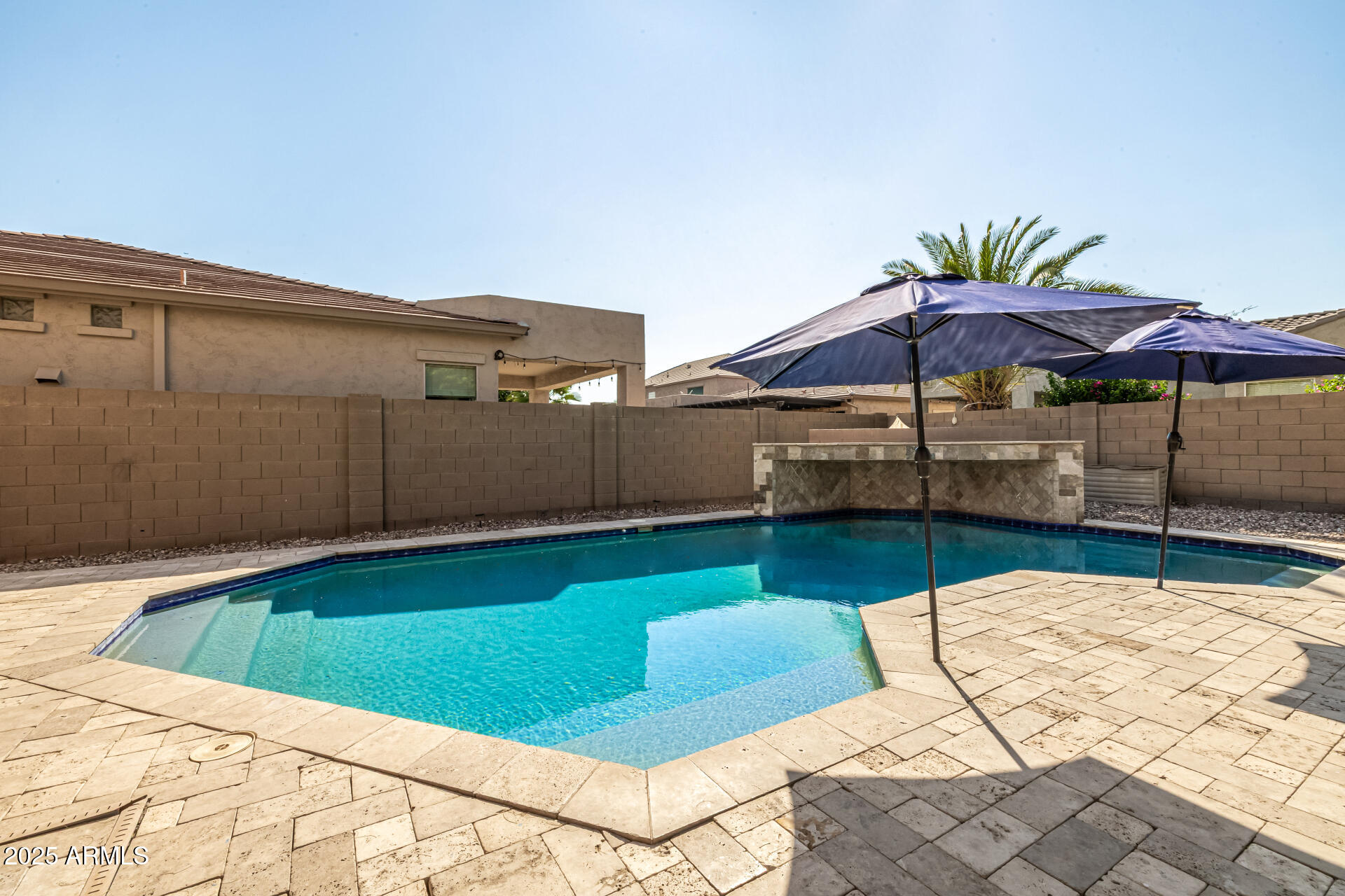 2026 North Rascon Loop Phoenix, AZ 85037 - Photo 30 of 38 a view of a backyard