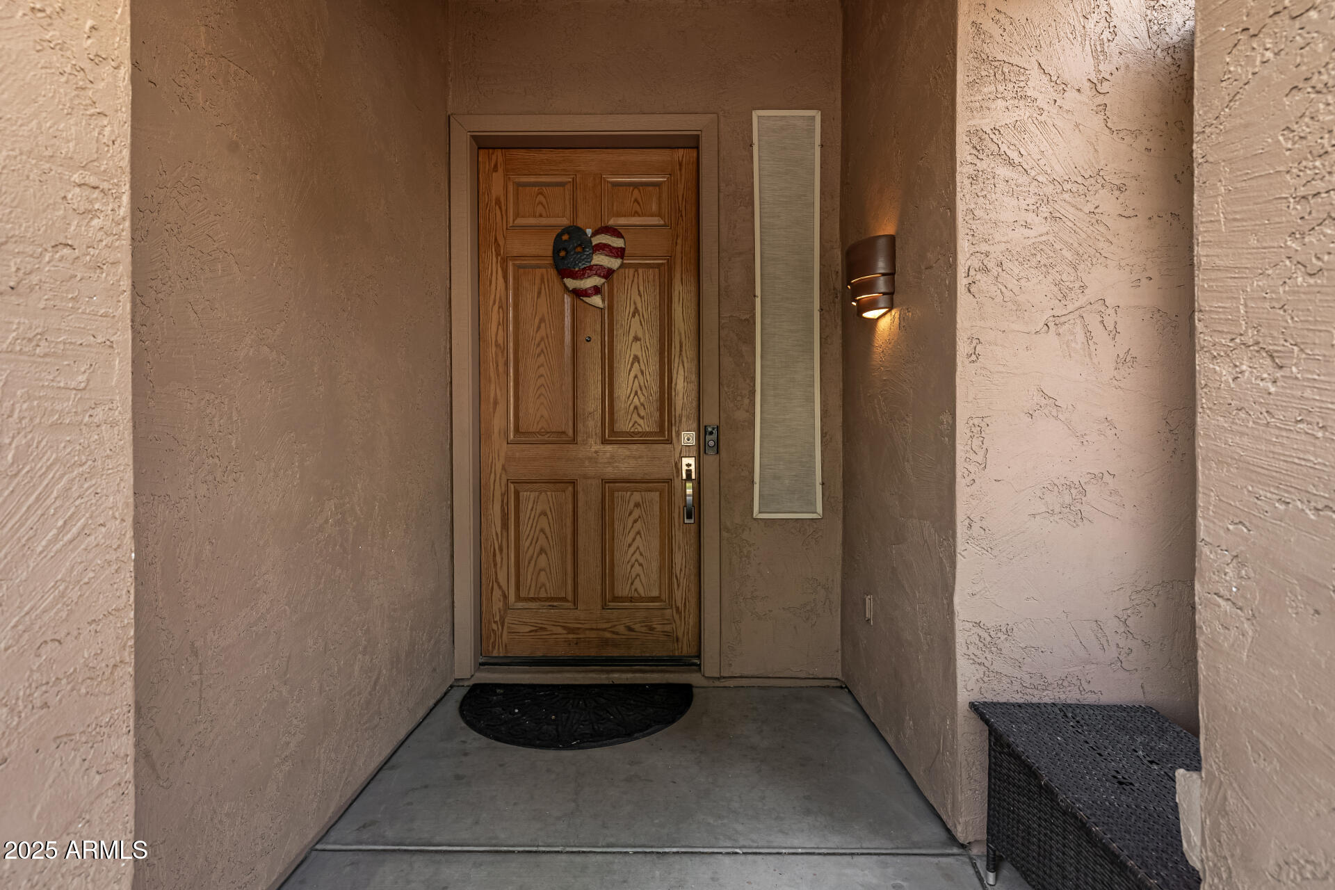 2026 North Rascon Loop Phoenix, AZ 85037 - Photo 35 of 38 a view of elevator with hallway