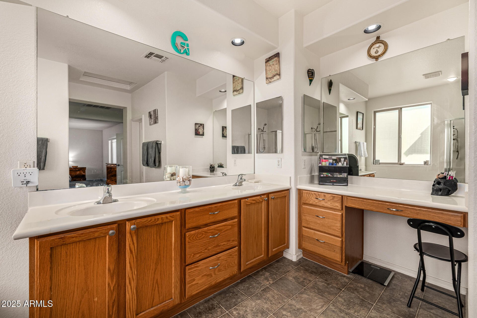 2026 North Rascon Loop Phoenix, AZ 85037 - Photo 5 of 38 a view of double vanity sink a mirror a window and a kitchen view