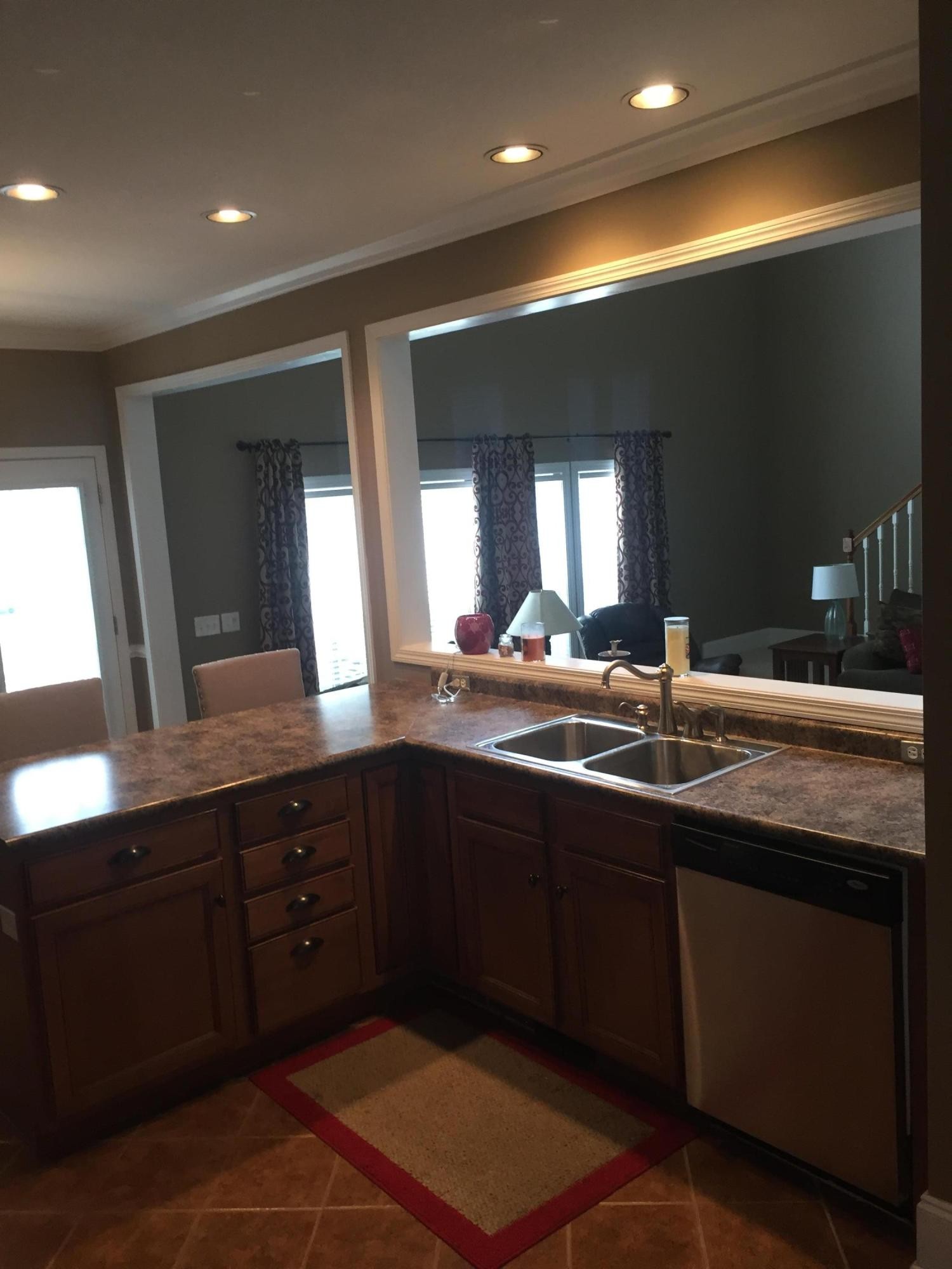 1016 Mountain Road Clinton, TN 37716 - Photo 11 of 30 a bathroom with a sink and a large mirror