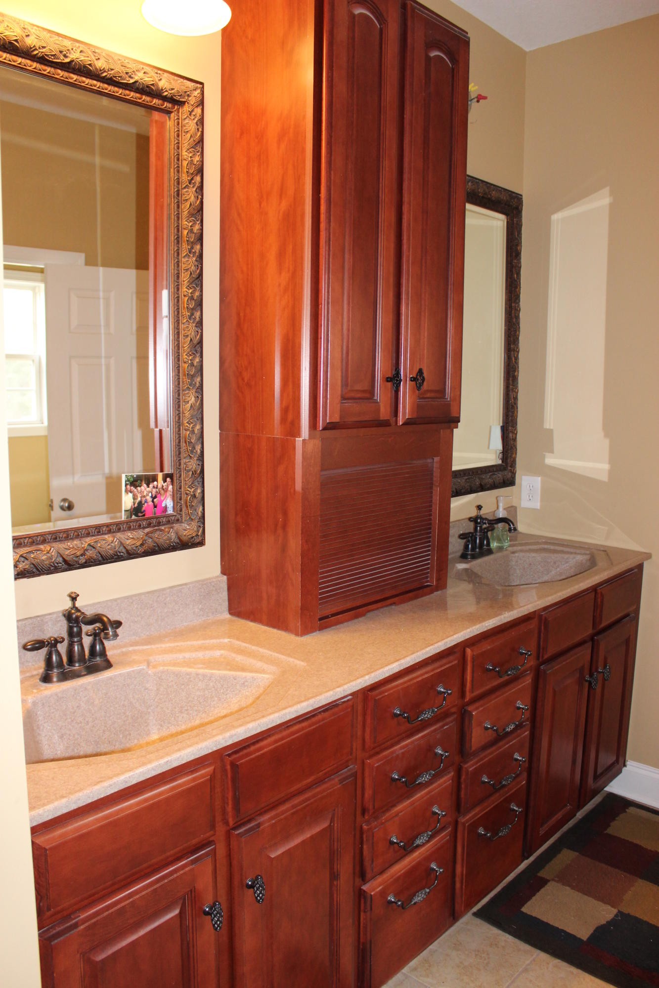 1016 Mountain Road Clinton, TN 37716 - Photo 19 of 30 a bathroom with a sink and a mirror