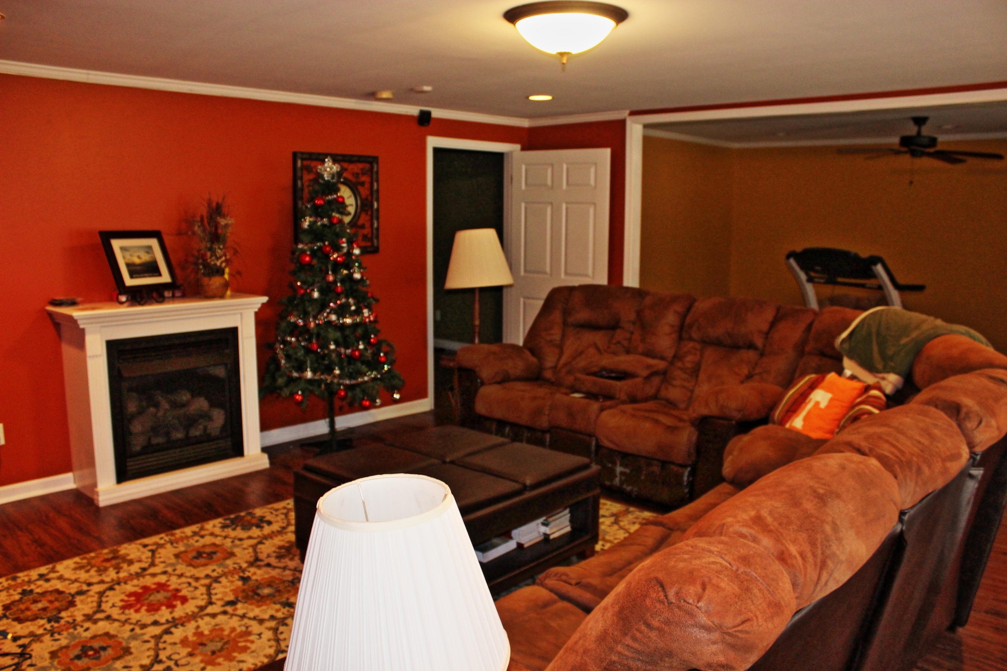 1016 Mountain Road Clinton, TN 37716 - Photo 25 of 30 a living room with furniture a lamp and a fireplace