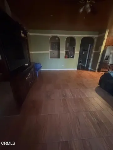 a white toilet sitting in a bathroom