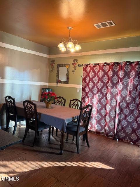 9116 Kellyann Street Bakersfield, CA 93313 - Photo 9 of 37 a outdoor dining space with furniture and wooden floor
