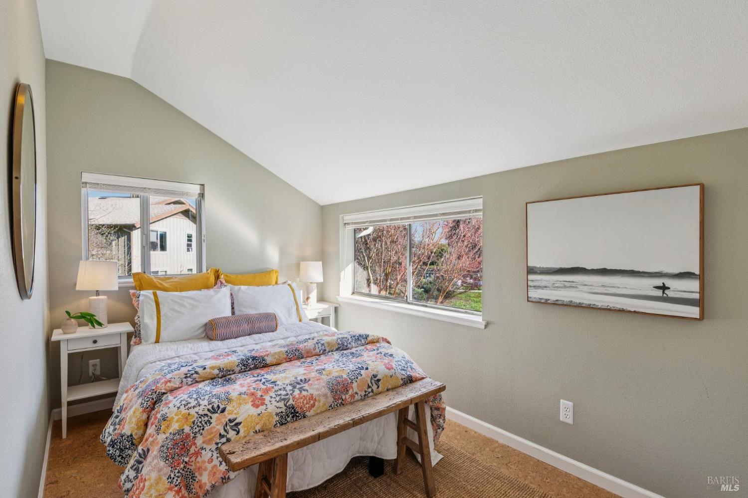 700 B Street Point Reyes Station, CA 94956 - Photo 11 of 26 a bedroom with a bed a painting on the wall and a dresser