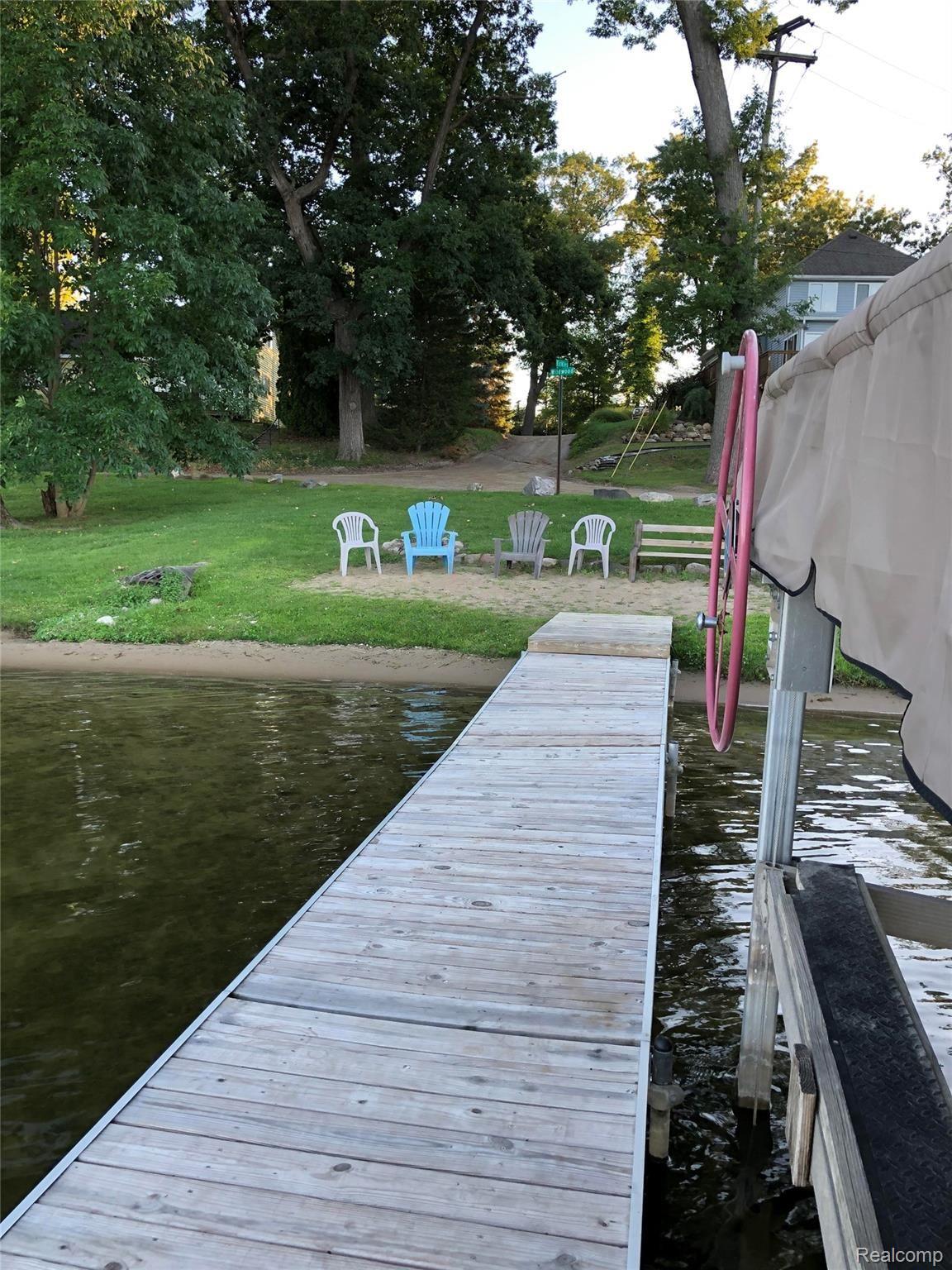 5343 Ridgemont Street Howell, MI 48843 - Photo 23 of 26 beach, dock and boat hoist