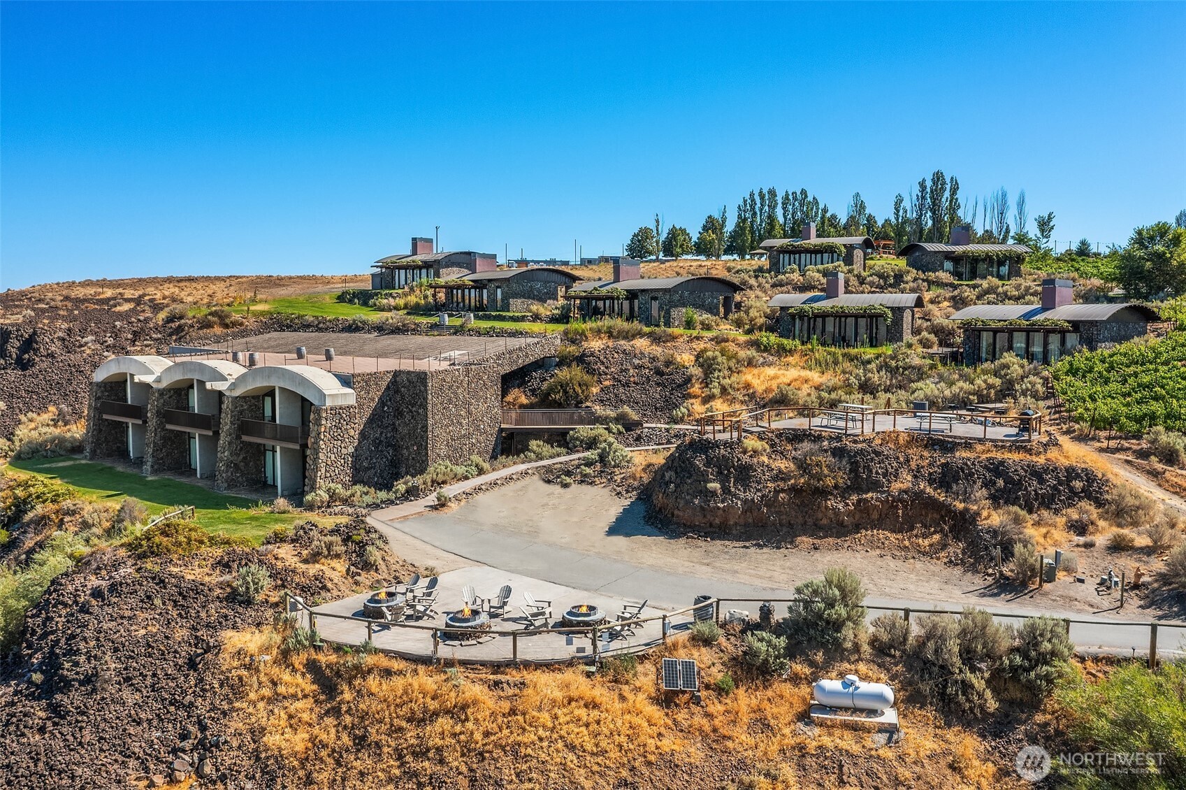 344 Silica Road Northwest, Unit 1 Quincy, WA 98848 - Photo 16 of 30 a view of a house with a yard and lake view