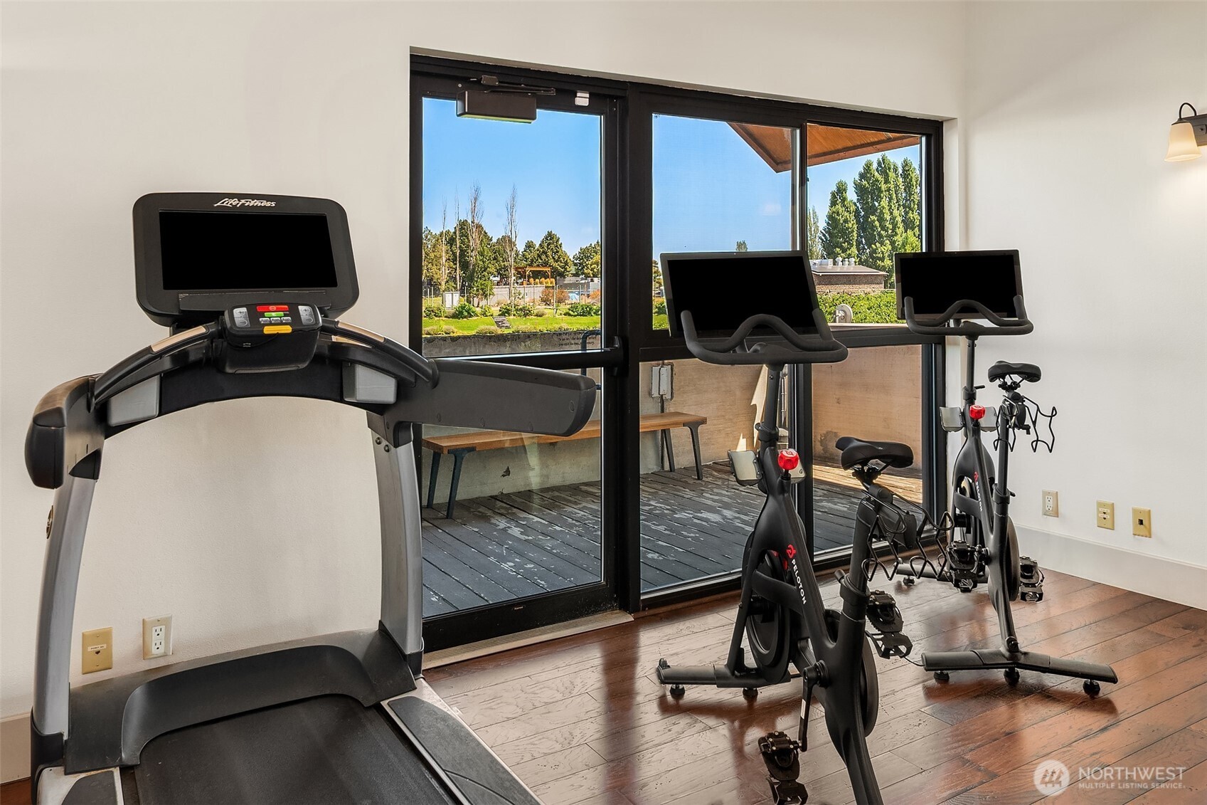 344 Silica Road Northwest, Unit 1 Quincy, WA 98848 - Photo 23 of 30 a view of a workspace with furniture and a flat screen tv