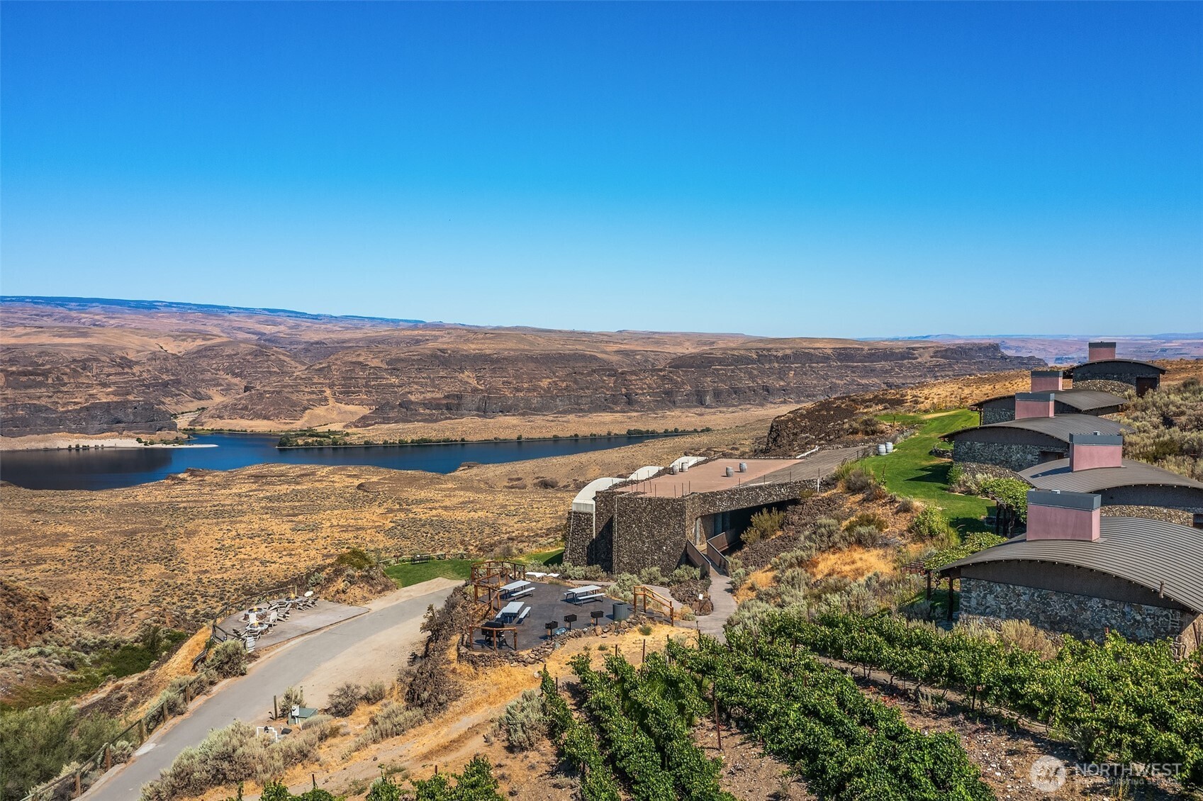 344 Silica Road Northwest, Unit 1 Quincy, WA 98848 - Photo 26 of 30 an aerial view of ocean and residential houses with outdoor space