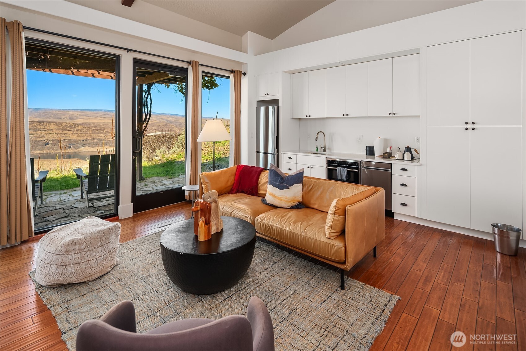 344 Silica Road Northwest, Unit 1 Quincy, WA 98848 - Photo 9 of 30 a living room with furniture and a large window