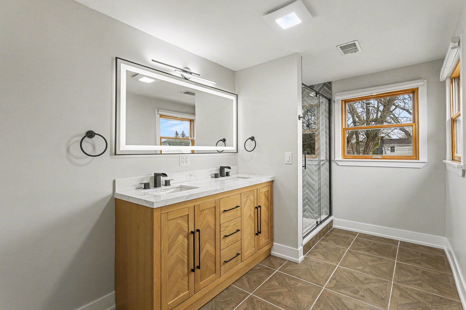 538 North Broadway Avenue Park Ridge, IL 60068 - Photo 18 of 34 a bathroom with a sink a toilet and mirror