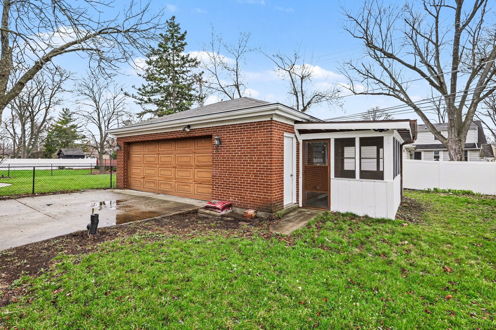 538 North Broadway Avenue Park Ridge, IL 60068 - Photo 29 of 34 a view of a white house with a yard and large tree