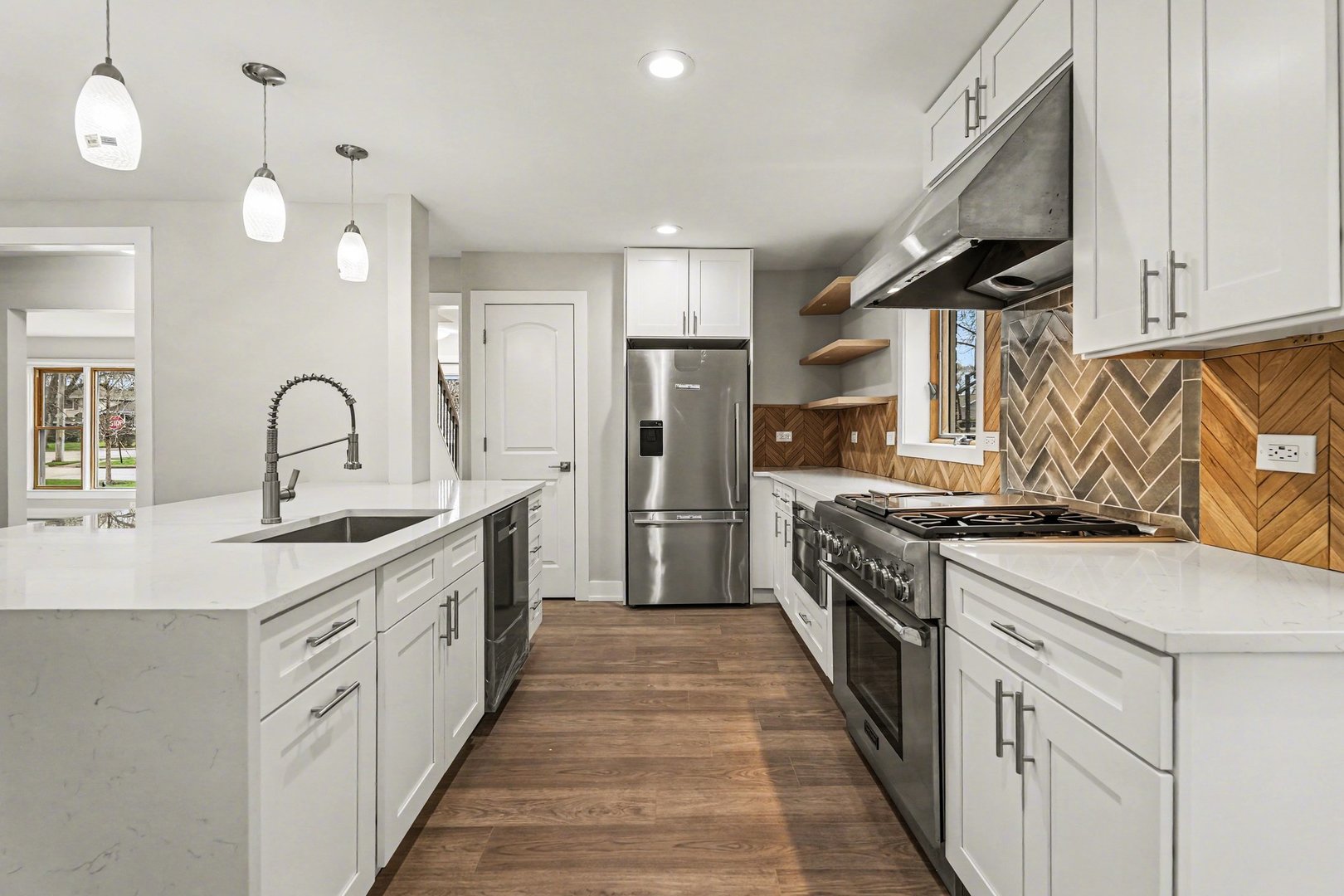 538 North Broadway Avenue Park Ridge, IL 60068 - Photo 4 of 34 a kitchen with white cabinets appliances and a sink