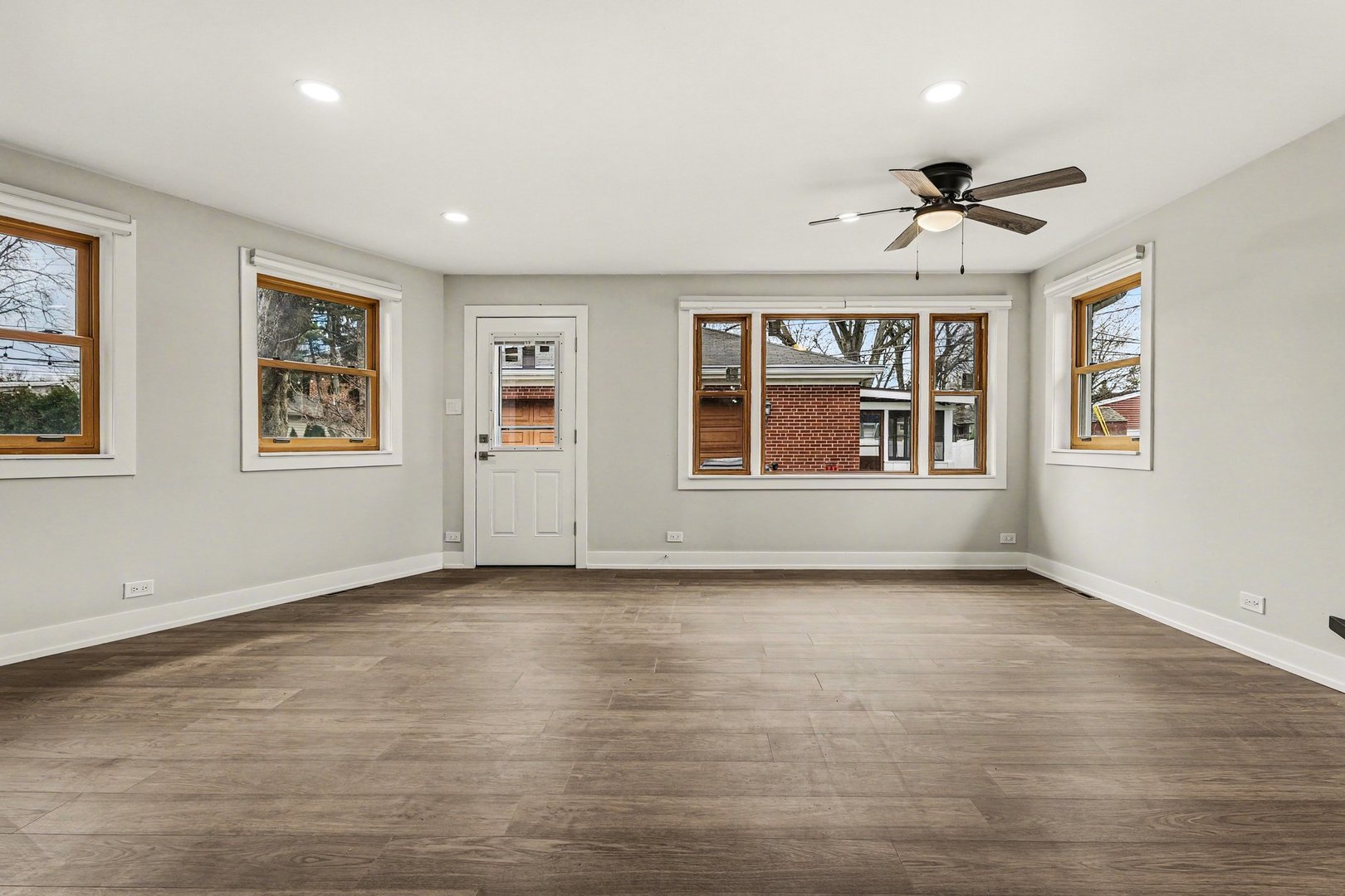 538 North Broadway Avenue Park Ridge, IL 60068 - Photo 10 of 34 a view of an empty room with a window and wooden floor