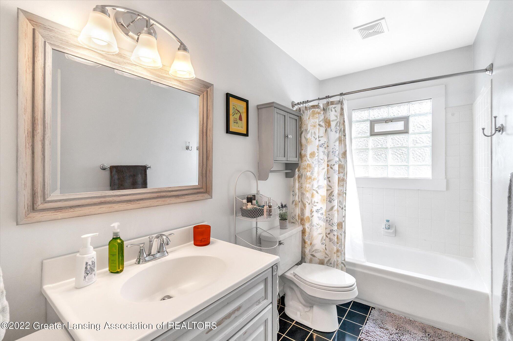 3129 Sunderland Road Lansing, MI 48911 - Photo 20 of 38 23-3129-Sunderland-Rd-WindowStill-Real-E