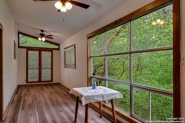 a view of a livingroom with furniture and window