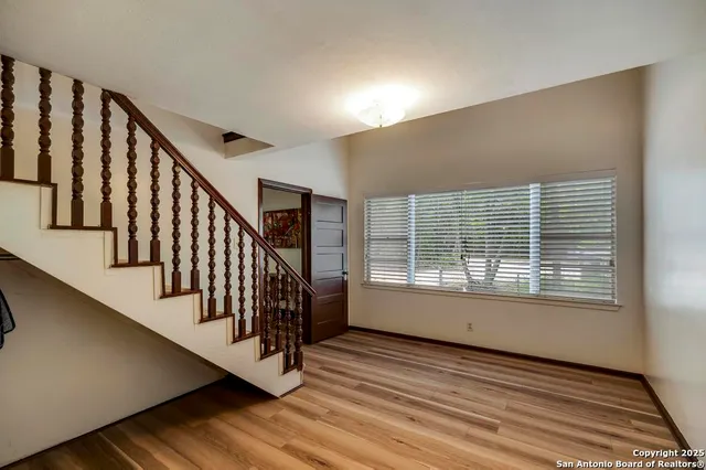 a bathroom with a sink toilet a mirror and vanity