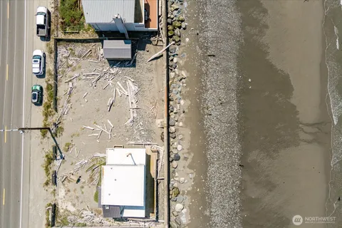 view of living room with furniture and a mirror