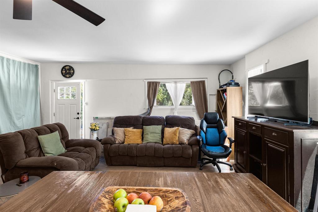 3340 Skytrail Ranch Road Jamul, CA 91935 - Photo 31 of 38 a living room with furniture and a flat screen tv