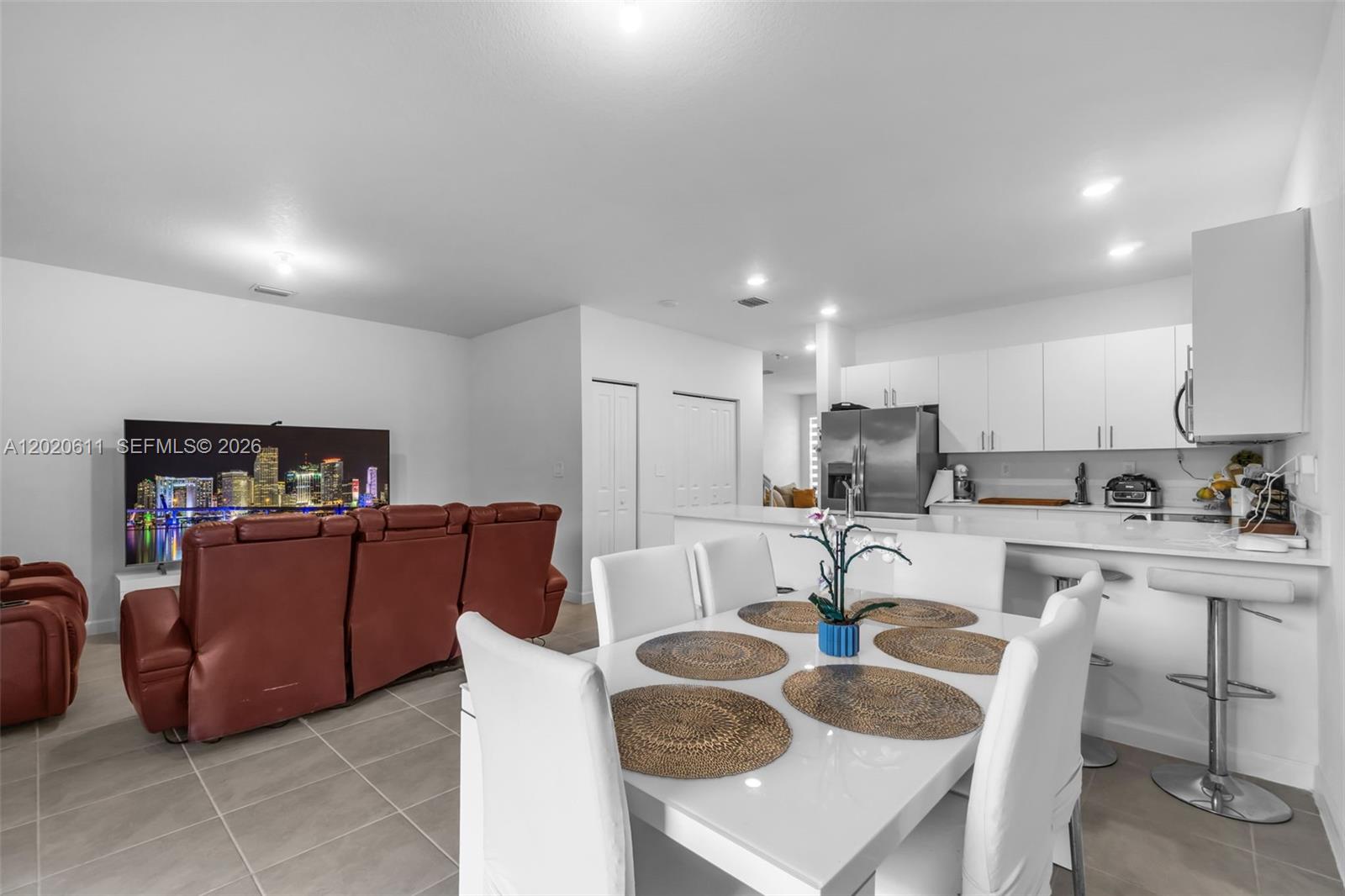 26455 Southwest 148th Avenue Homestead, FL 33032 - Photo 8 of 35 a living room with furniture a sink and kitchen view