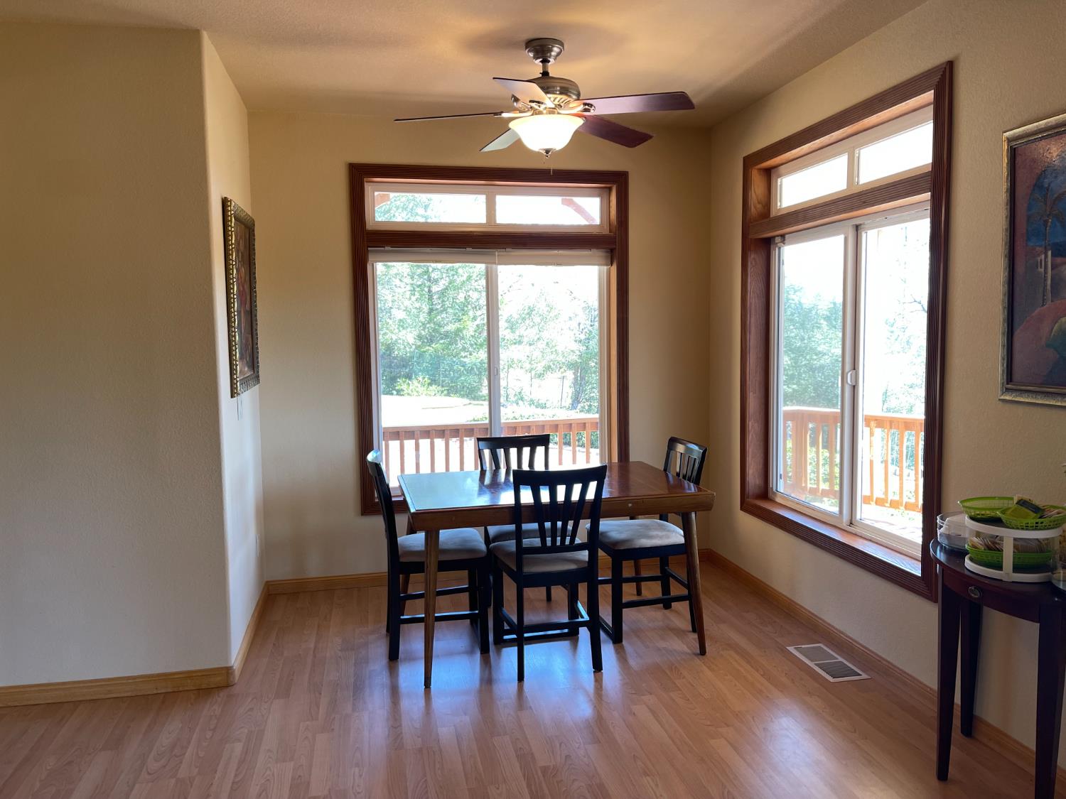 717 Swanson Lane Colfax, CA 95713 - Photo 11 of 44 a dining room with furniture window wooden floor