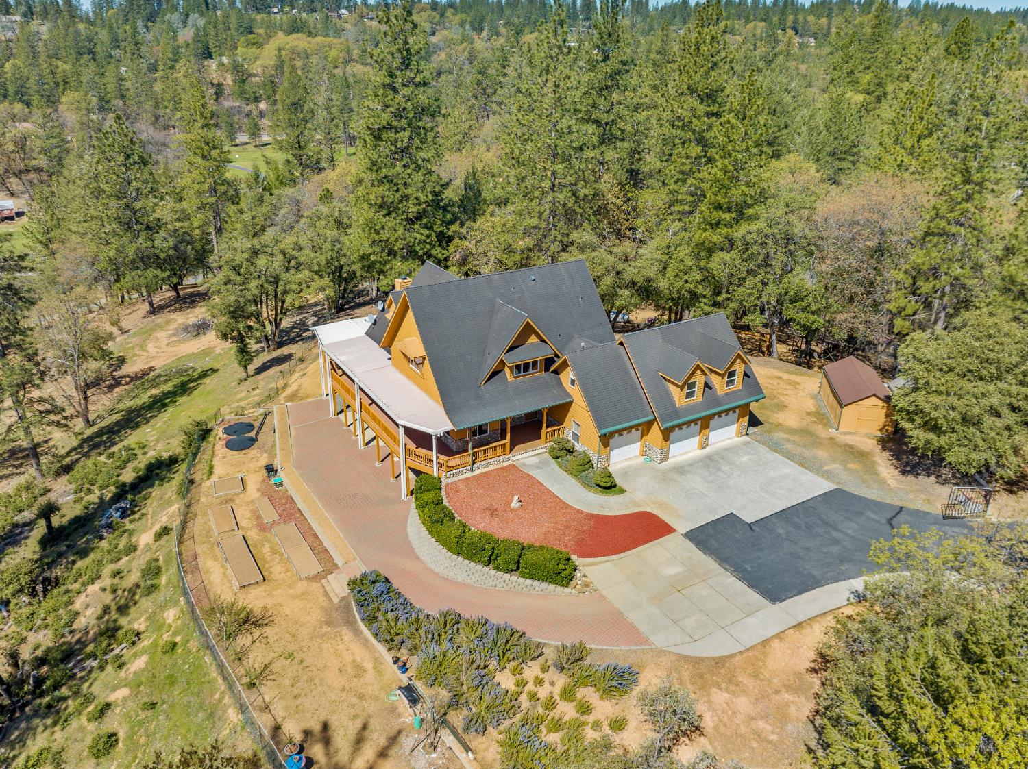 717 Swanson Lane Colfax, CA 95713 - Photo 2 of 44 an aerial view of a house with swimming pool