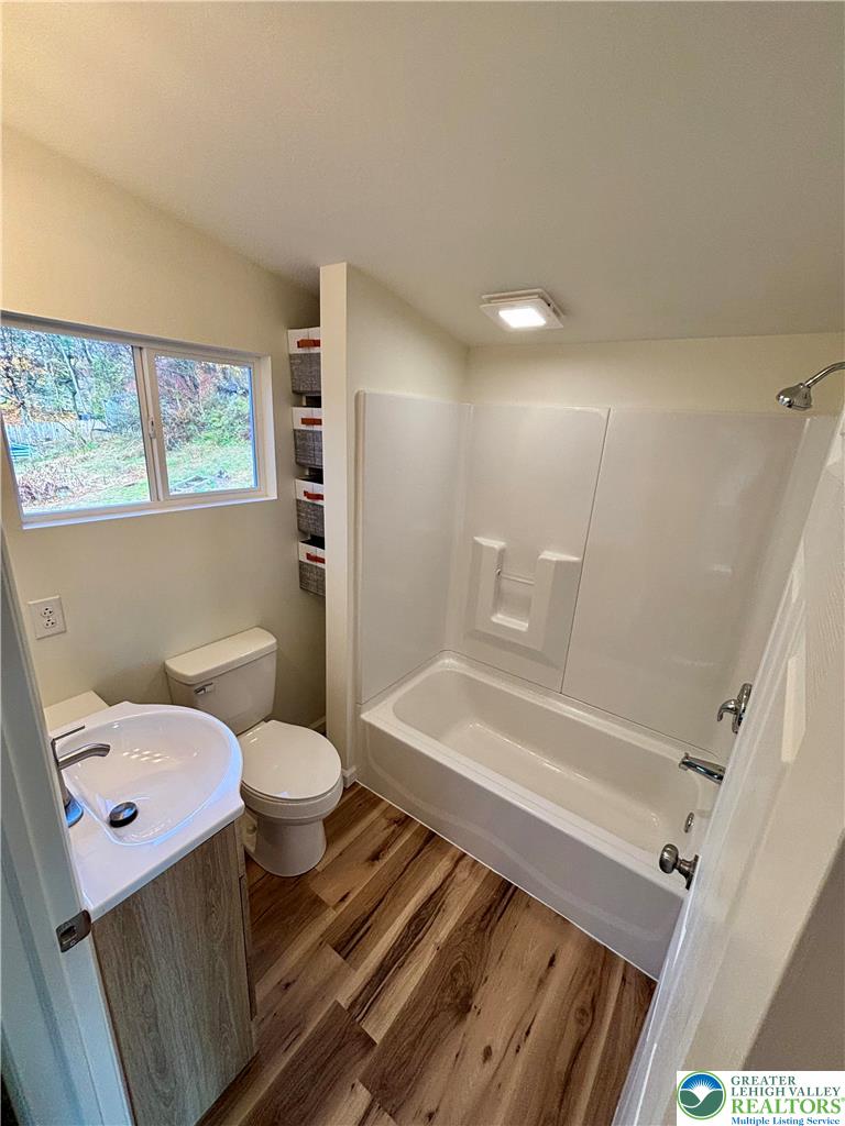 253 Main Street Parryville, PA 18071 - Photo 22 of 31 a bathroom with a sink and a toilet
