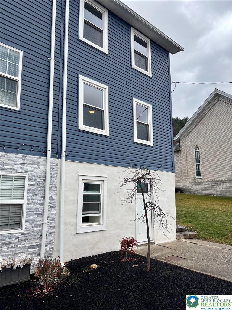 253 Main Street Parryville, PA 18071 - Photo 31 of 31 a view of a house with backyard and garden