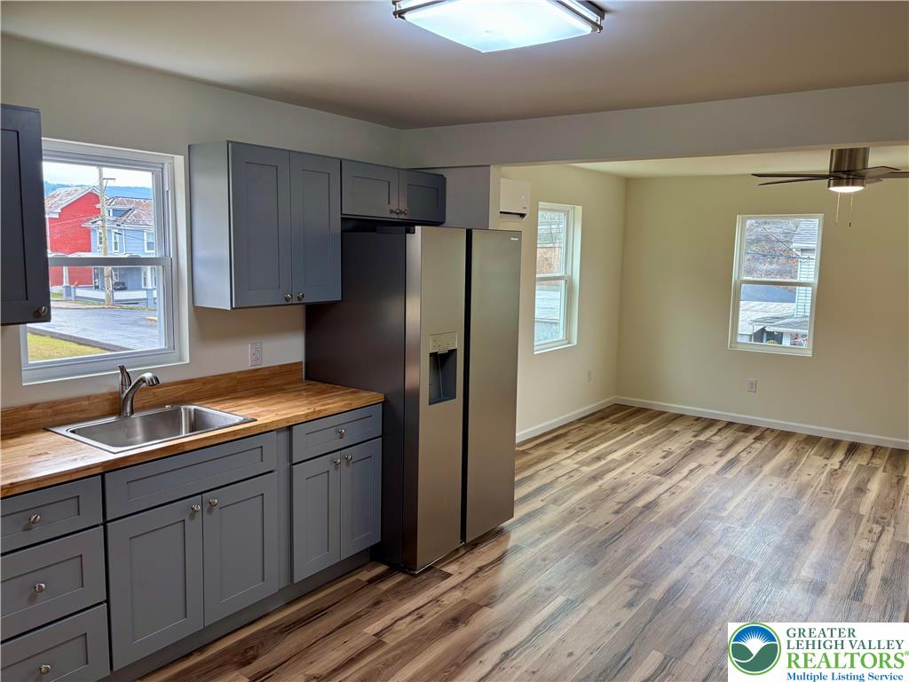 253 Main Street Parryville, PA 18071 - Photo 5 of 31 a kitchen with a refrigerator and window