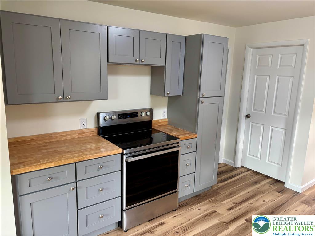 253 Main Street Parryville, PA 18071 - Photo 7 of 31 a kitchen with cabinets and steel stainless steel appliances