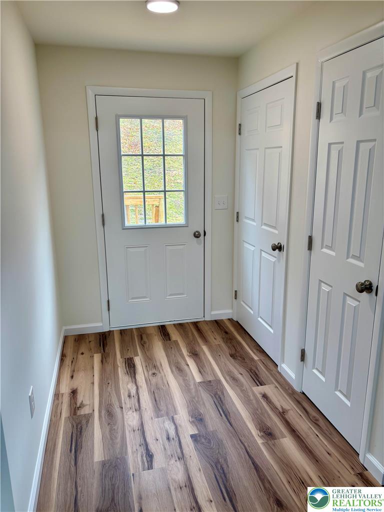 253 Main Street Parryville, PA 18071 - Photo 9 of 31 a view of a room with wooden floor and white walls