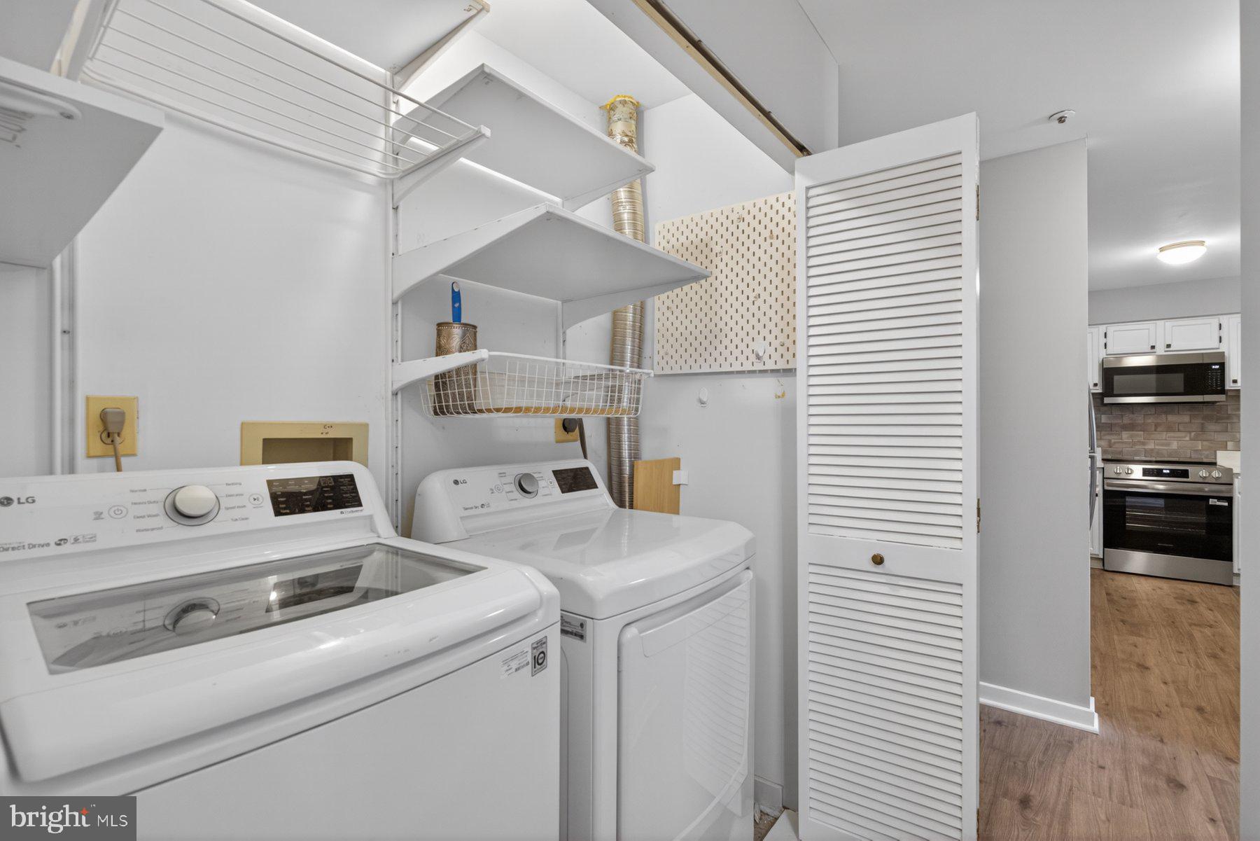 365 Pleasanton Road, Unit A13 Westminster, MD 21157 - Photo 12 of 25 a utility room with dryer and washer
