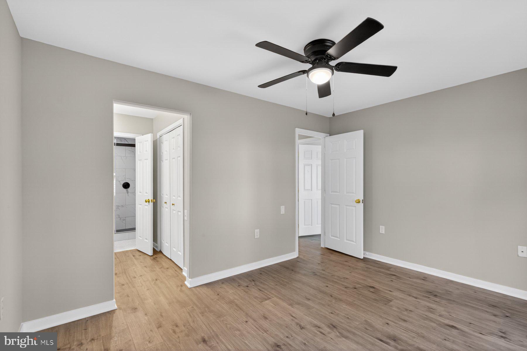 365 Pleasanton Road, Unit A13 Westminster, MD 21157 - Photo 18 of 25 a view of empty room with wooden floor