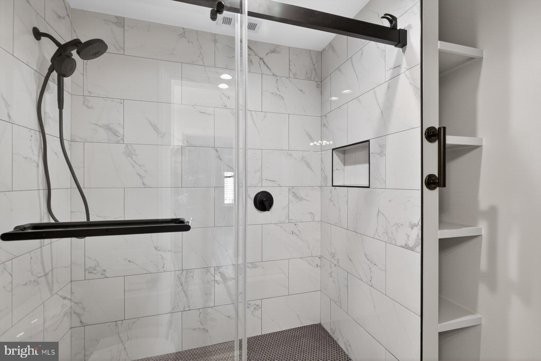 365 Pleasanton Road, Unit A13 Westminster, MD 21157 - Photo 20 of 25 a bathroom with a shower